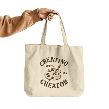 Creating_with_My_Creator_Christian_Ar_CottonTote_L_HandTransparent_Mockup.png